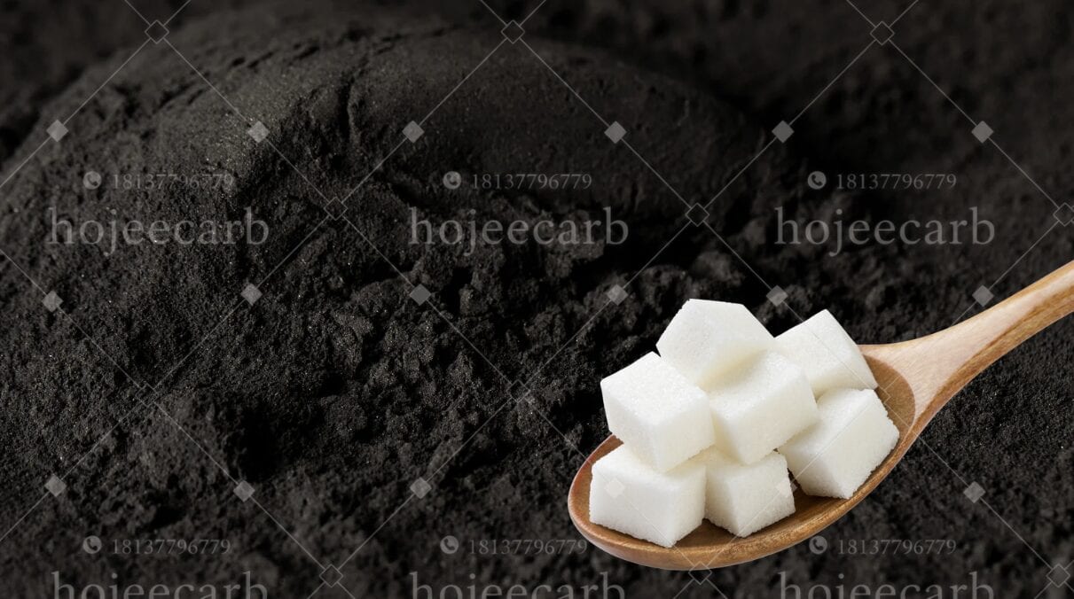 White refined sugar cubes produced after activated carbon decolorization
