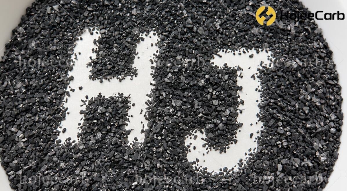 550 kg bulk bags of acid washed coconut shell activated carbon being loaded onto the truck for export to Uzbekistan — FIBC jumbo bags secured for ocean and overland freight