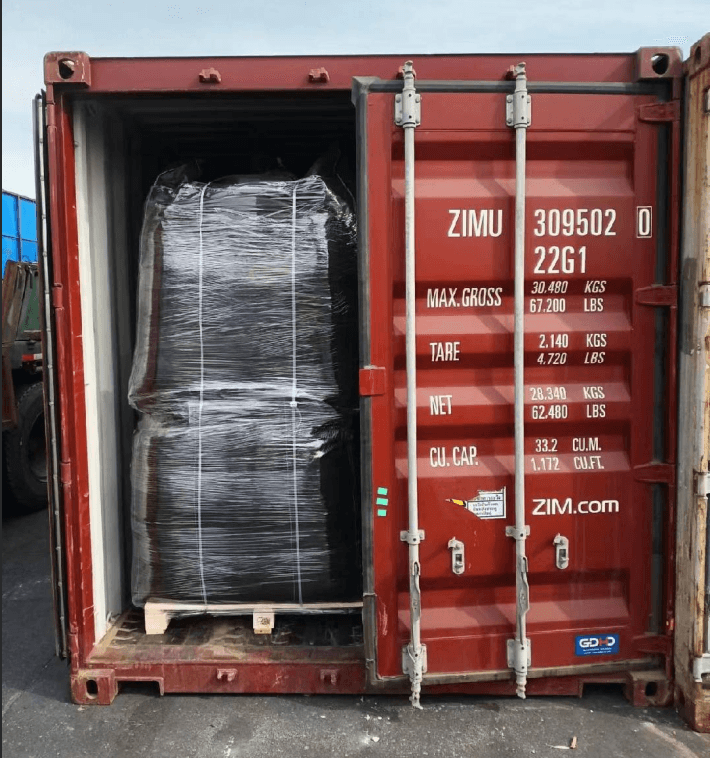Activated carbon palletized and packed in shipping container ready for delivery