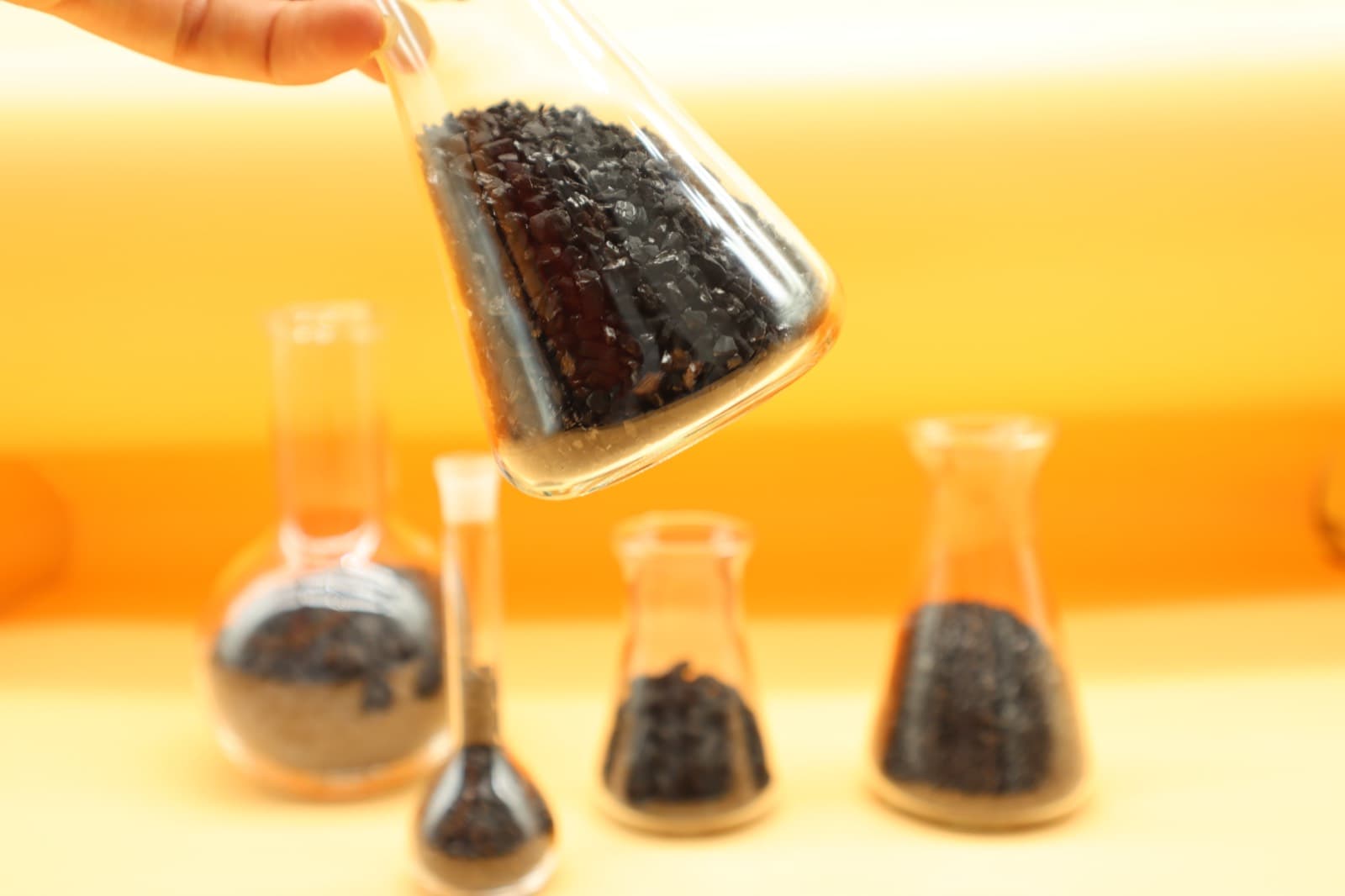 Side-by-side comparison of coconut shell and coal-based activated carbon granules