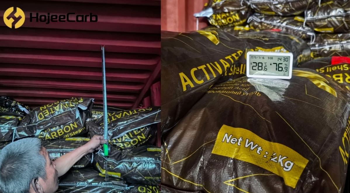 Loading supervision on gold recovery activated carbon for Ethiopia — a tape measure verifying stack dimensions inside the container and a digital gauge reading 28.6°C and 76.9% humidity on the packaged coconut shell carbon bags