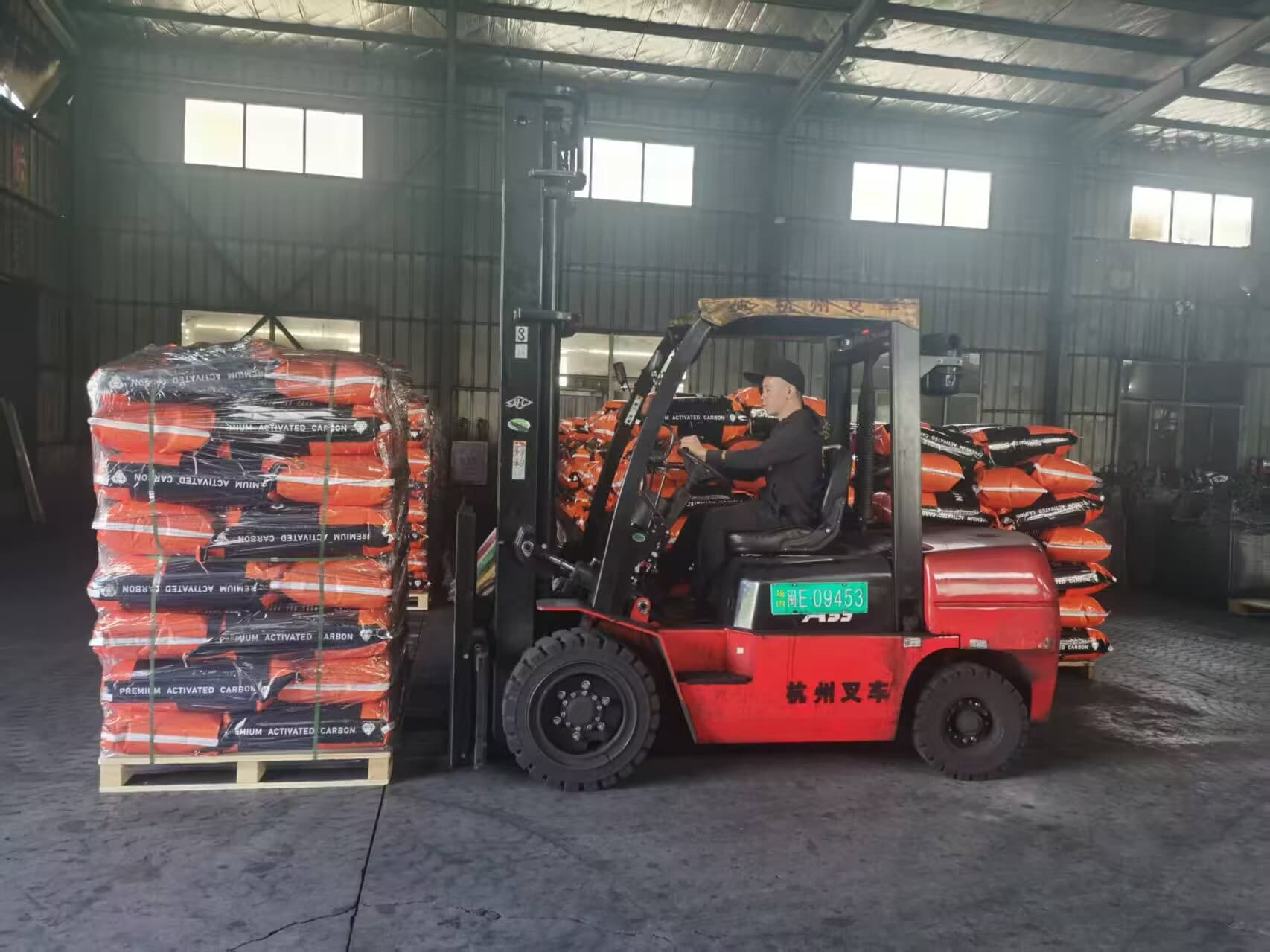 Activated carbon warehouse logistics and forklift loading for export shipping