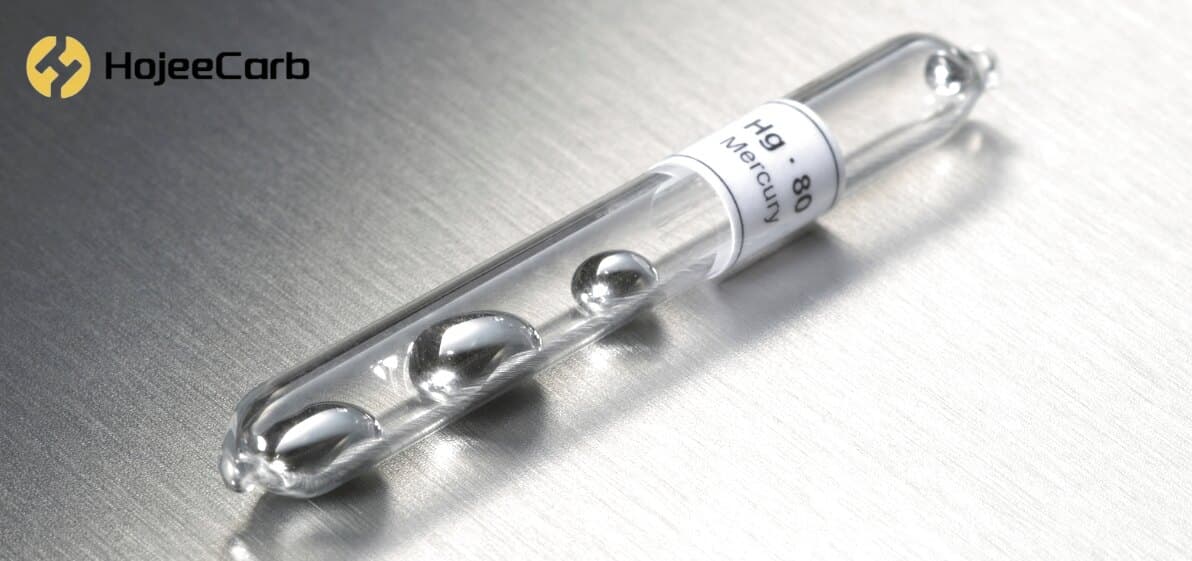 Sealed glass ampoule of liquid mercury (Hg, atomic number 80) on a brushed steel surface — the emission target for activated carbon injection mercury control