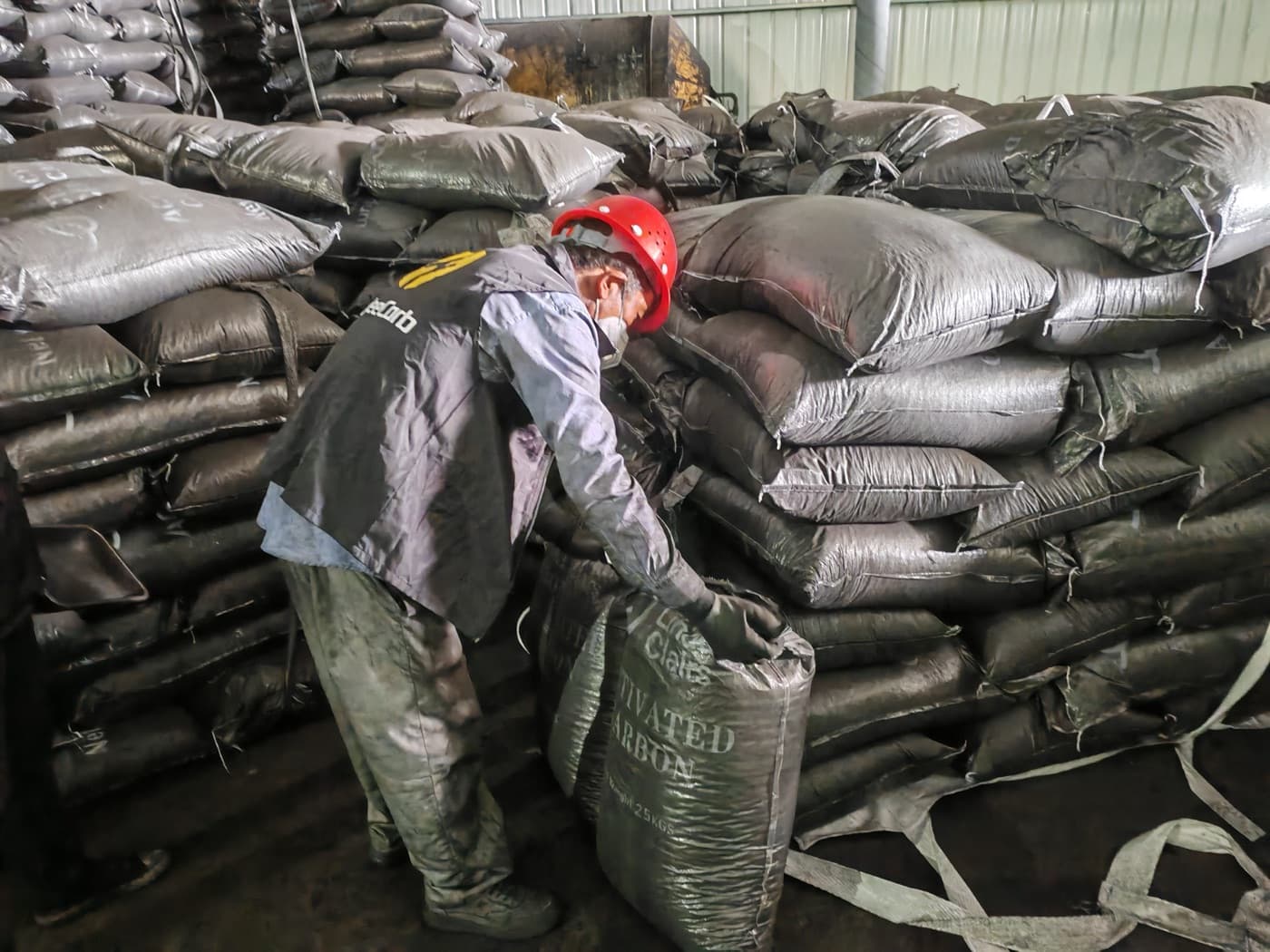 100 tons of packaged coal-based columnar activated carbon stacked and inspected before shipment to Norway