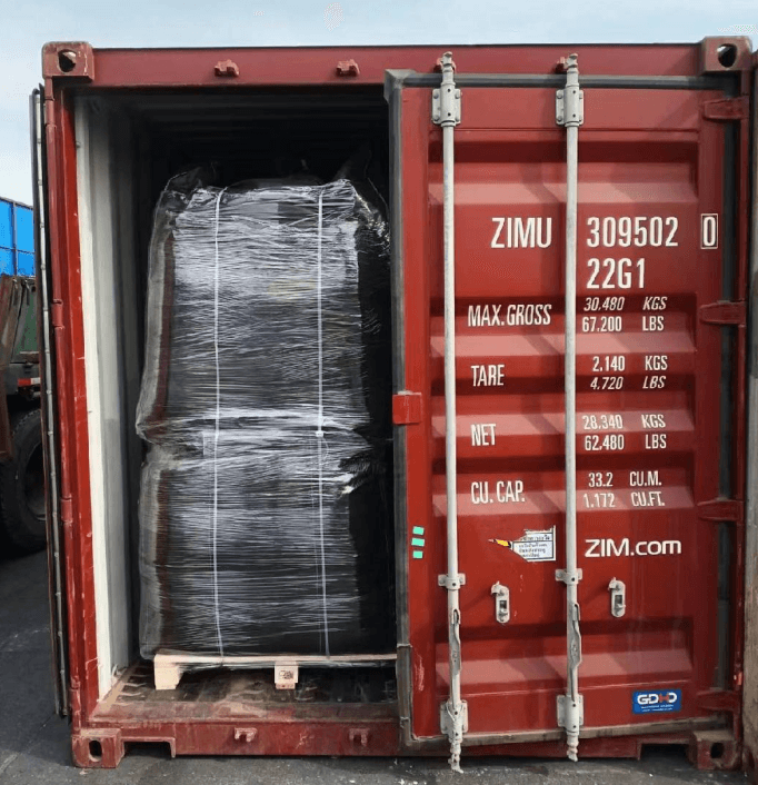 Activated carbon jumbo bags loaded into ZIM shipping container for Norway delivery