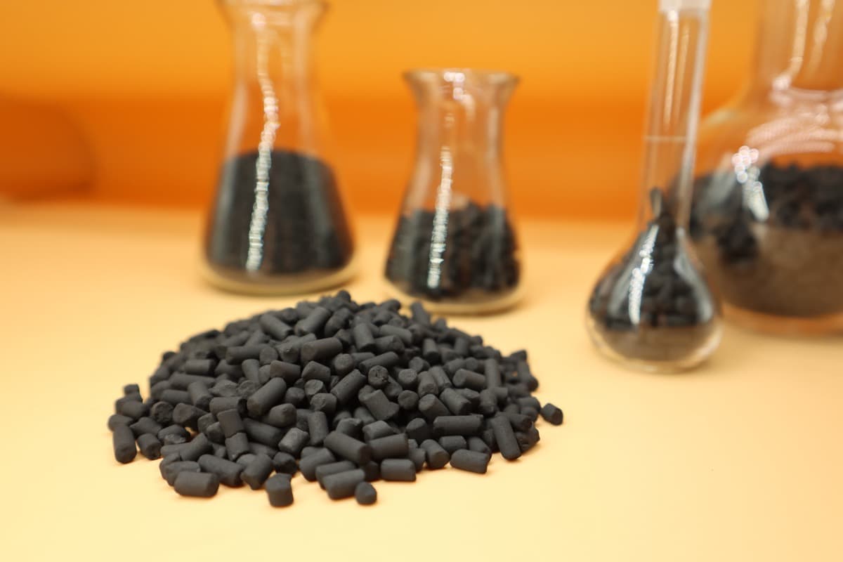 Activated carbon pellets for air and gas treatment applications