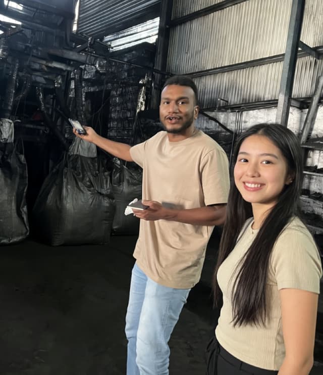 Client inspecting activated carbon jumbo bags in the warehouse