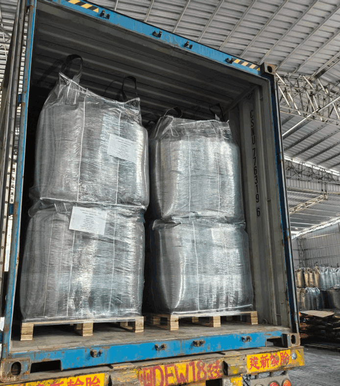Activated carbon jumbo bags loaded into export container on pallets