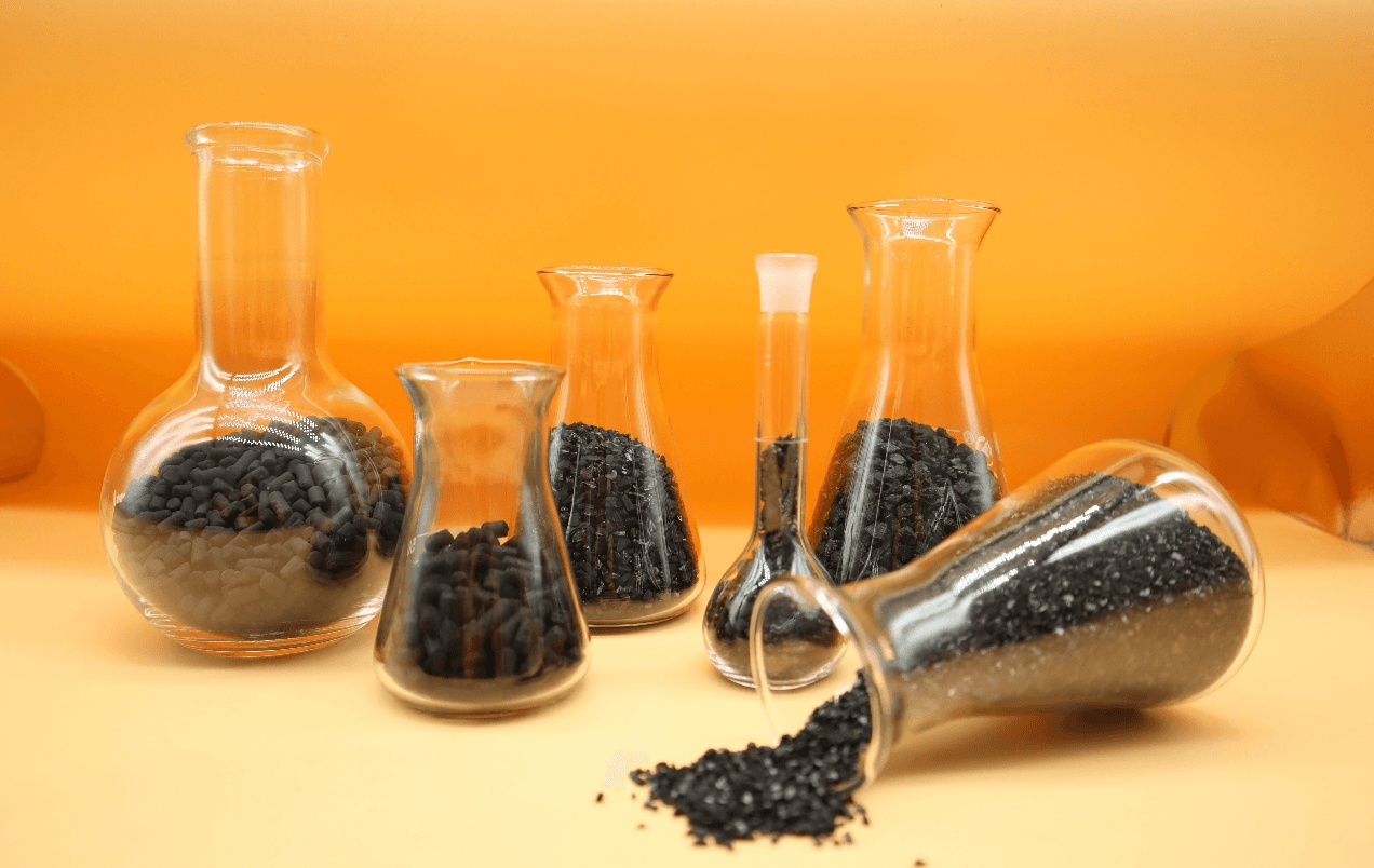 Laboratory testing of activated carbon quality — conical flasks with carbon samples for iodine and catalytic activity testing