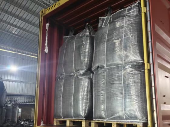 Activated carbon jumbo bags loaded inside an export shipping container