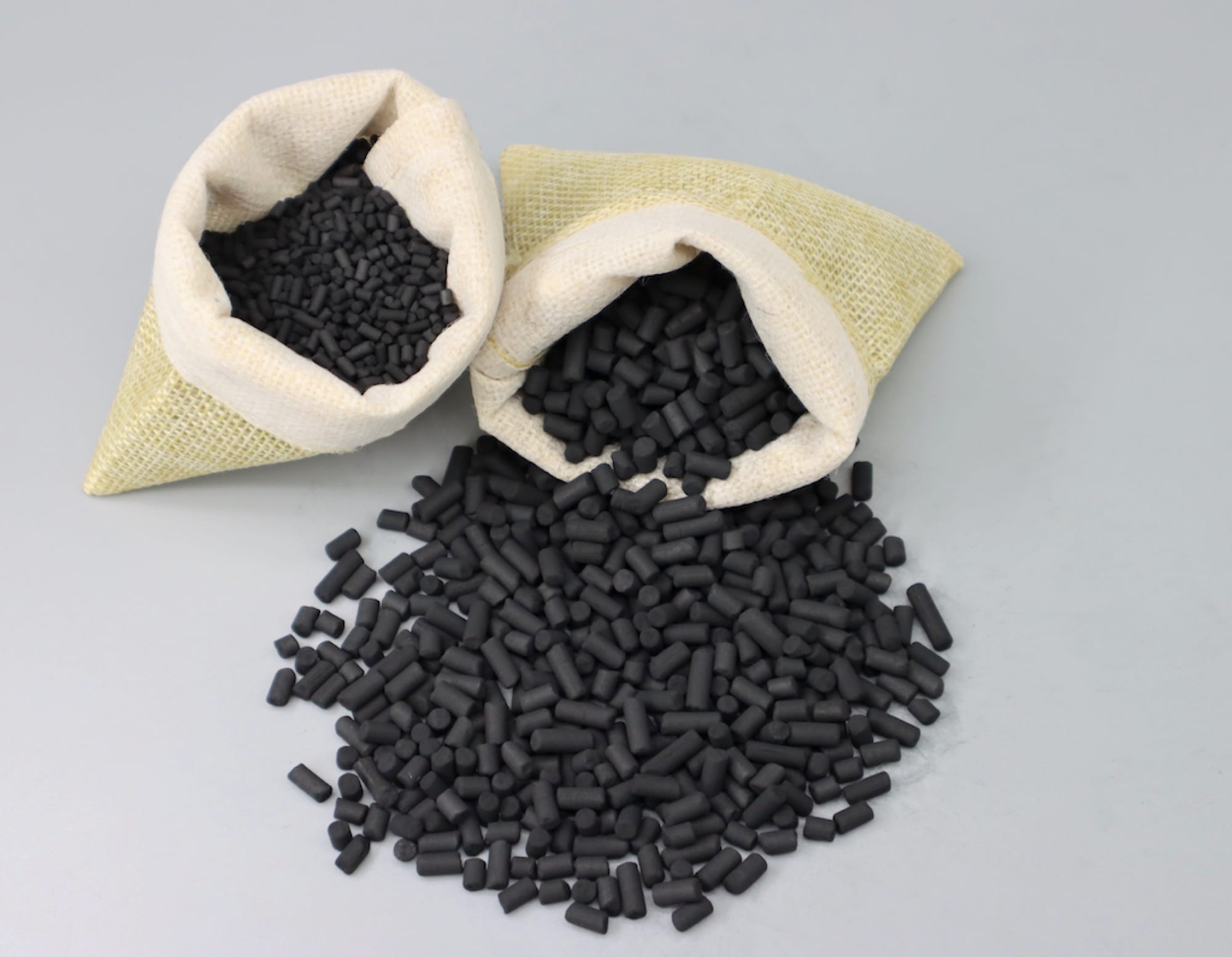 Columnar activated carbon pellets for industrial solvent recovery