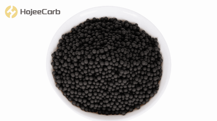 Spherical activated carbon granules in bowl
